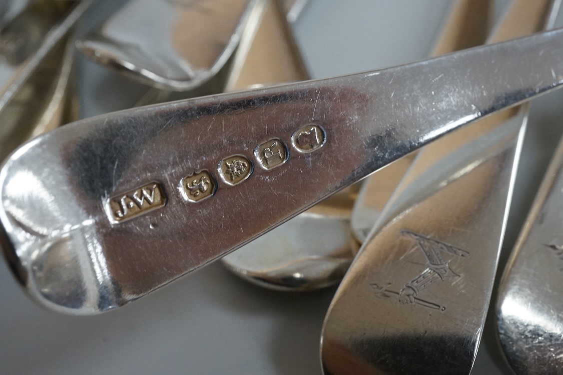 A harlequin part canteen of 19th century Old English pattern flatware, comprising thirty items, all with engraved crest, various dates and makers, 38.1oz.